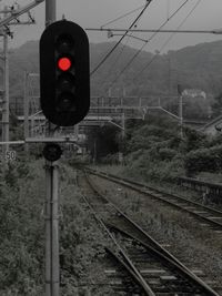 Railroad tracks against clear sky