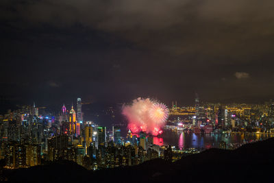 Firework display over city