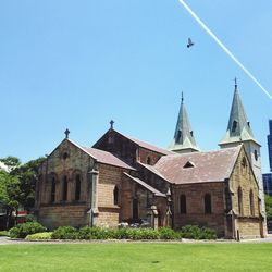 Low angle view of built structure against blue sky