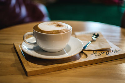 Coffee cup on table