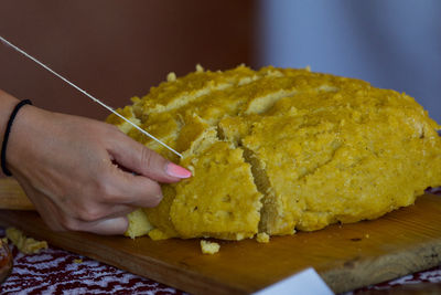 Close-up of person preparing food