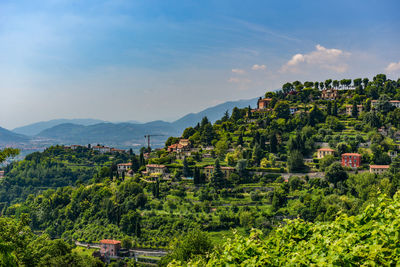 Scenic view of townscape against sky