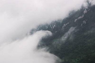 Low angle view of fog against sky