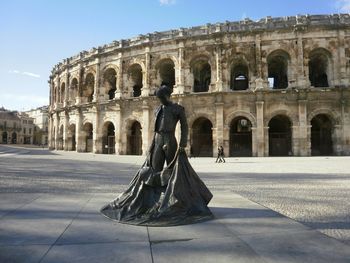 Sculpture of bullfighter at arena of nimes