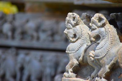 Close-up of statue against temple