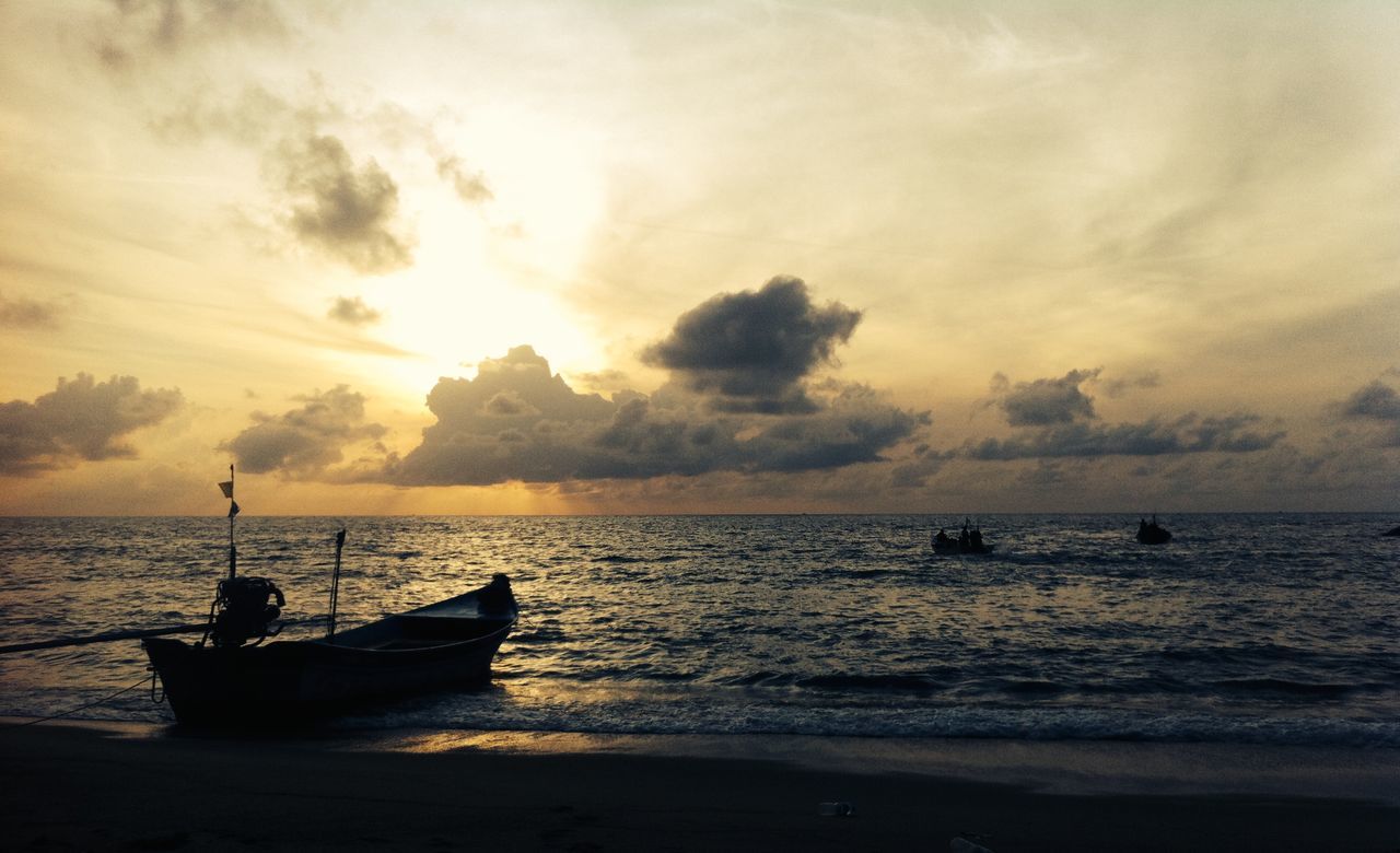 nautical vessel, transportation, boat, mode of transport, water, sea, sunset, sky, moored, tranquility, tranquil scene, scenics, beauty in nature, horizon over water, cloud - sky, nature, beach, silhouette, idyllic, shore