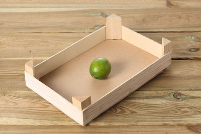 High angle view of fruits in box on table