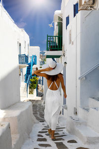 Rear view of woman walking in city