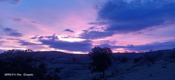 Scenic view of landscape against sky during sunset