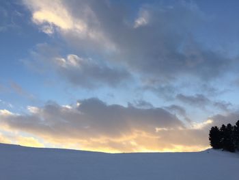 Scenic view of mountains against sky during sunset