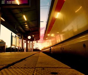 Train at railroad station against sky