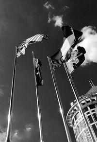 Low angle view of flag against sky