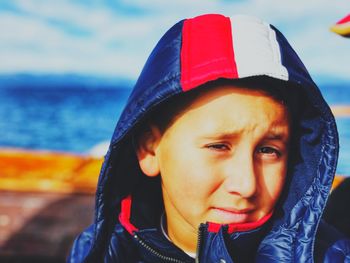 Close-up of boy wearing hooded jacket