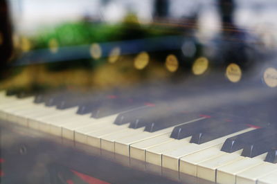 Grand piano seen through window