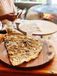 Close-up of preparing food on cutting board