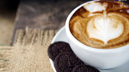 Close-up of cappuccino on table