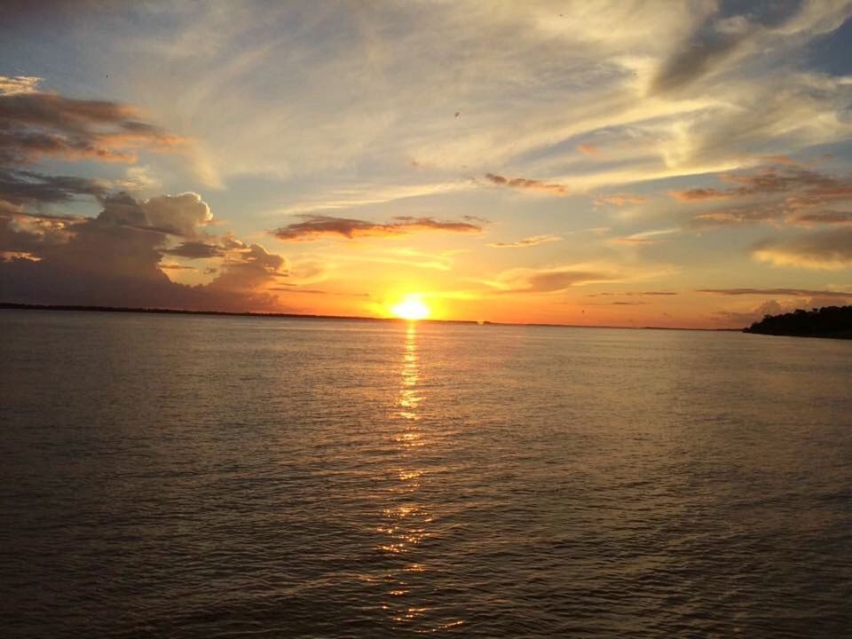 SCENIC VIEW OF SEA DURING SUNSET