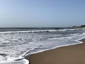 Scenic view of sea against clear sky