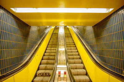 Low angle view of escalator in subway station