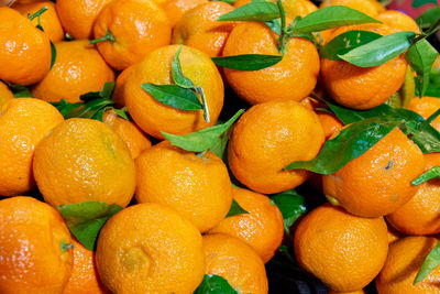 Full frame shot of oranges in market