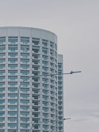 Low angle view of modern buildings against clear sky