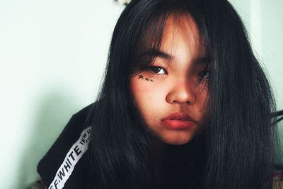 Close-up portrait of young woman