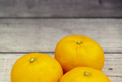 Close-up of oranges on table