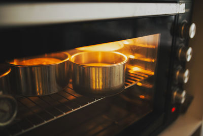 Close-up of containers in oven