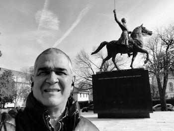 Portrait of a man statue against sky