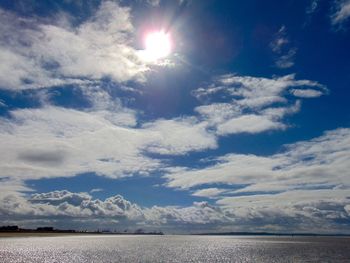 Sun shining through clouds