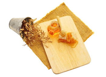 High angle view of bread on table against white background