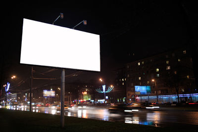 Illuminated street light at night