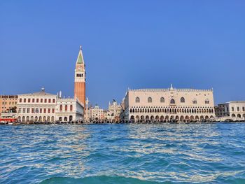 View of buildings against blue sky venice