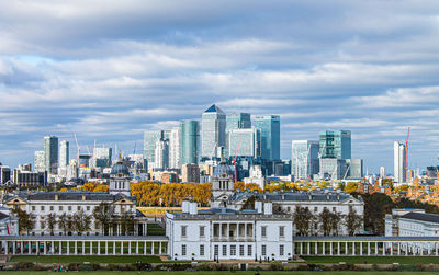 Buildings in city against sky