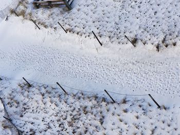 High angle view of snow on field