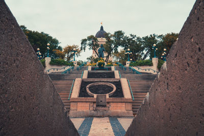 Statue of temple against sky