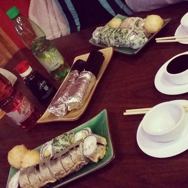 indoors, food and drink, still life, table, food, variation, freshness, high angle view, healthy eating, choice, close-up, large group of objects, no people, arrangement, plate, wood - material, book, abundance, drink, ready-to-eat