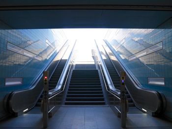 Low angle view of escalator at subway