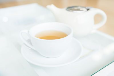 High angle view of coffee in cup on table