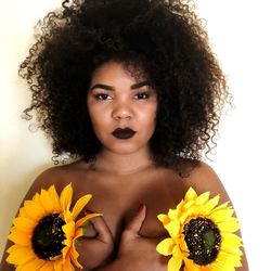 Portrait of a beautiful young woman over white background