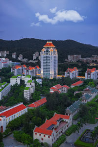 High angle view of buildings in city against sky