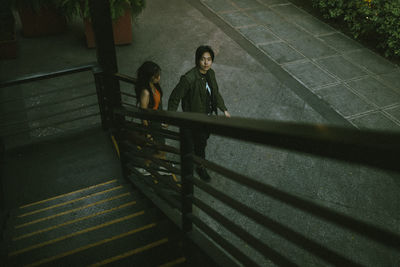 Couple walking on steps