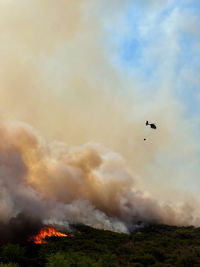 Low angle view of airshow against sky