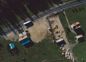 Aerial view of road by field