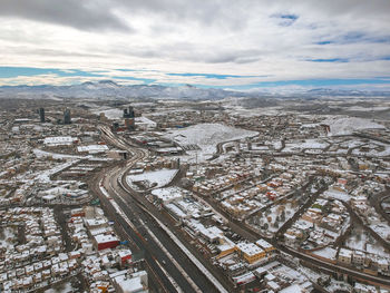 High angle view of road amidst buildings in city