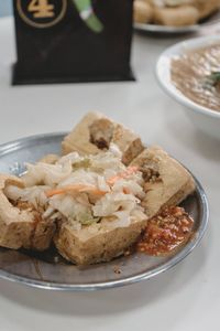 Close-up of food in plate on table