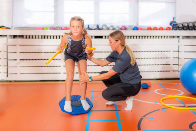 Balance exercises for children, using balancing disks