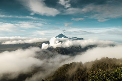 Scenic view of volcanic mountain against sky