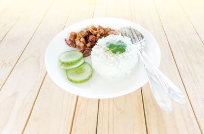 High angle view of food in plate on table