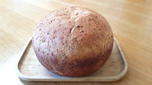 High angle view of bread on cutting board